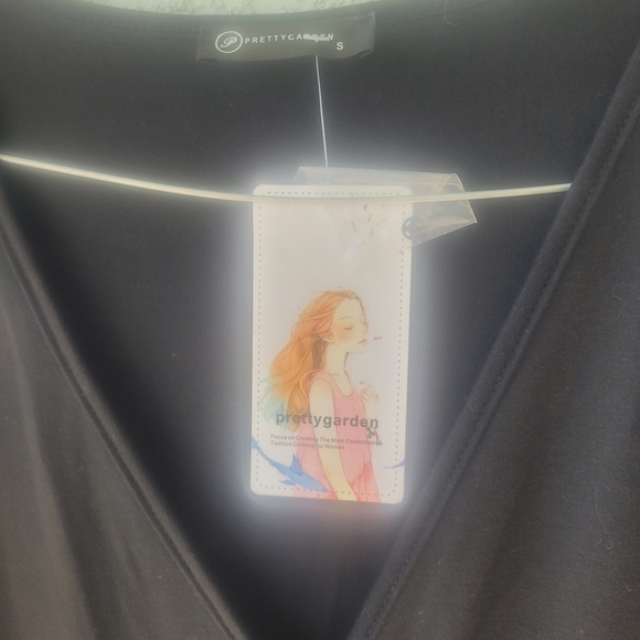 Sophisticated Black Wrap-Style Jumpsuit with Tapered Legs - Picture 3 of 14